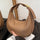 Women's one-shoulder cross-body underarm handbag and you can take this bag with you when you go shopping anywhere. You will feel very comfortable in your hand when you carry this bag.